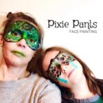 kid and adult with green reptile masks face painting